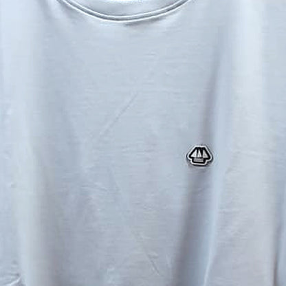T-shirt Romain Hublot perle, détail du tissu et du logo